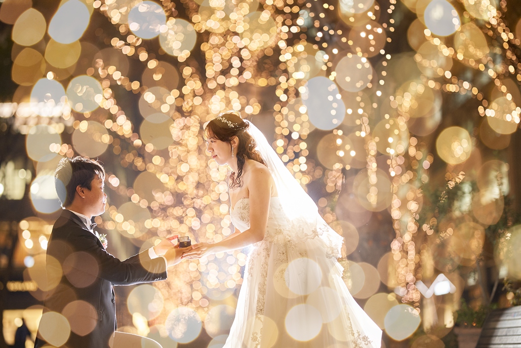 A magical moment at Tokyo Station with night lights and elegant attire