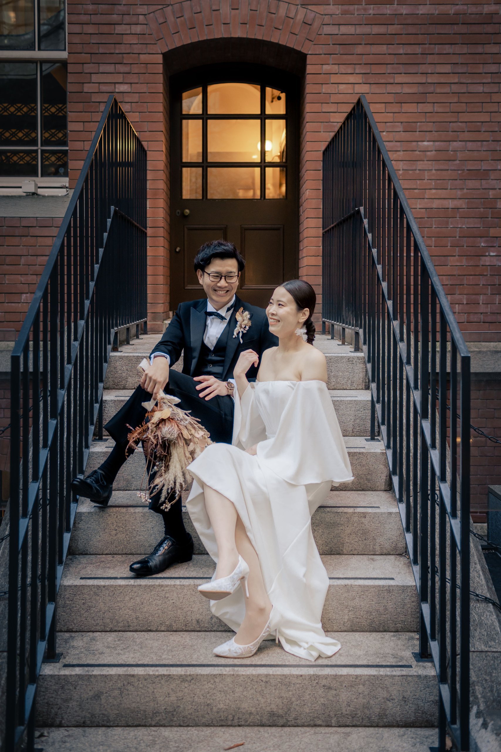 Couple laughing together naturally during their pre-wedding photo shoot in Tokyo