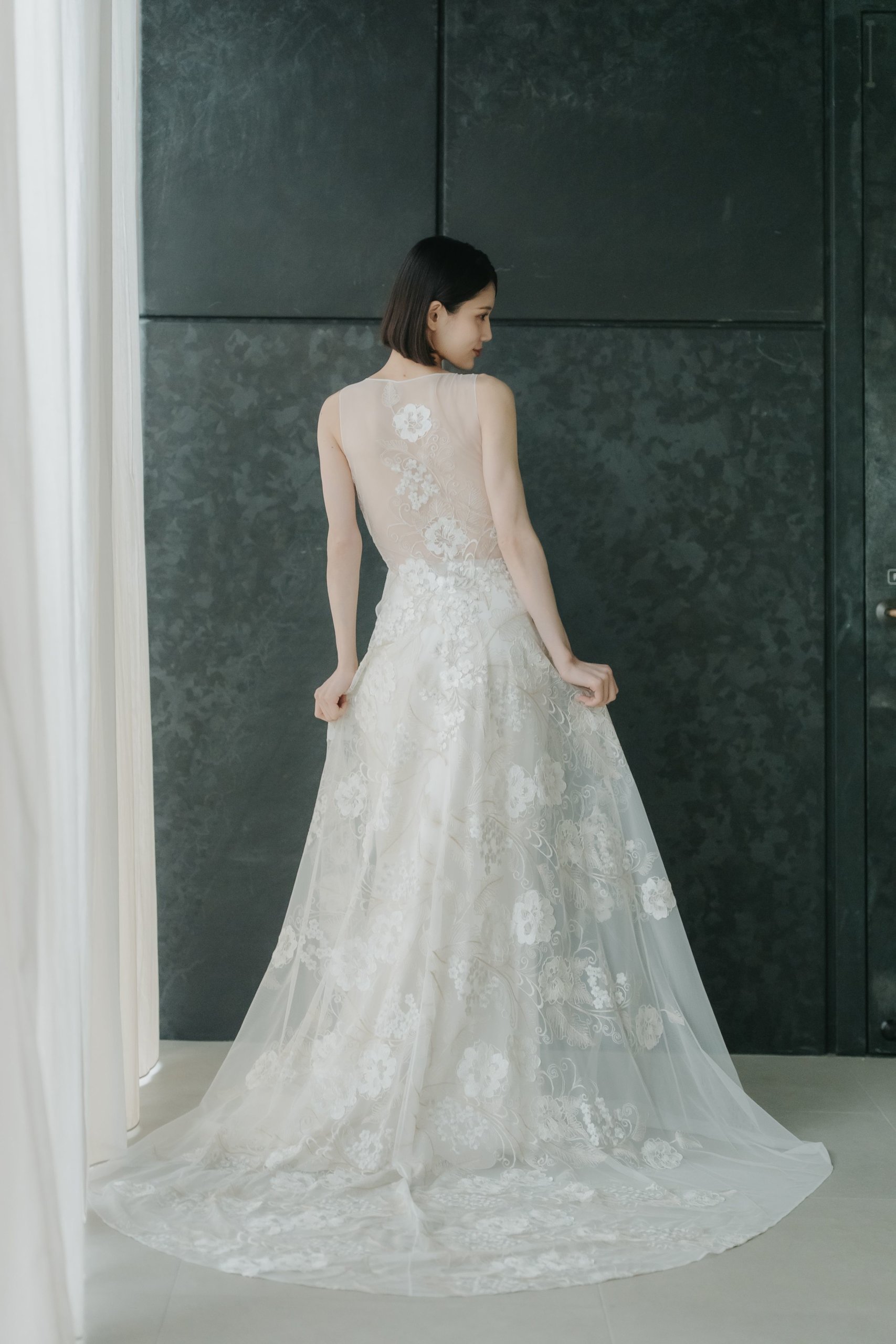 Bride wearing an elegant summer wedding dress for a photo shoot in Tokyo