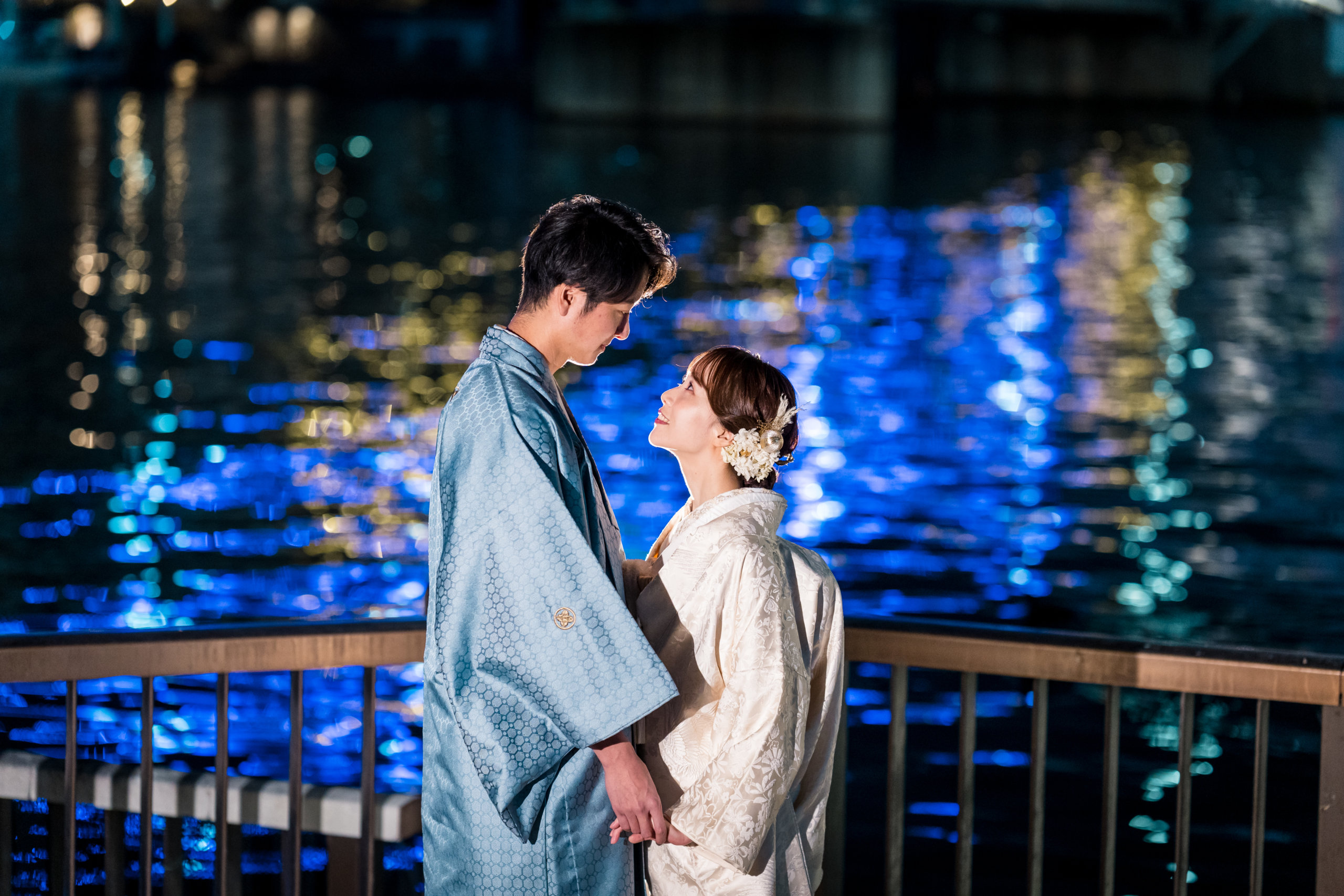 Tokyo Skytree and Sumida River wedding photography — kimono-clad couple with the 634m tower reflected in the still river water