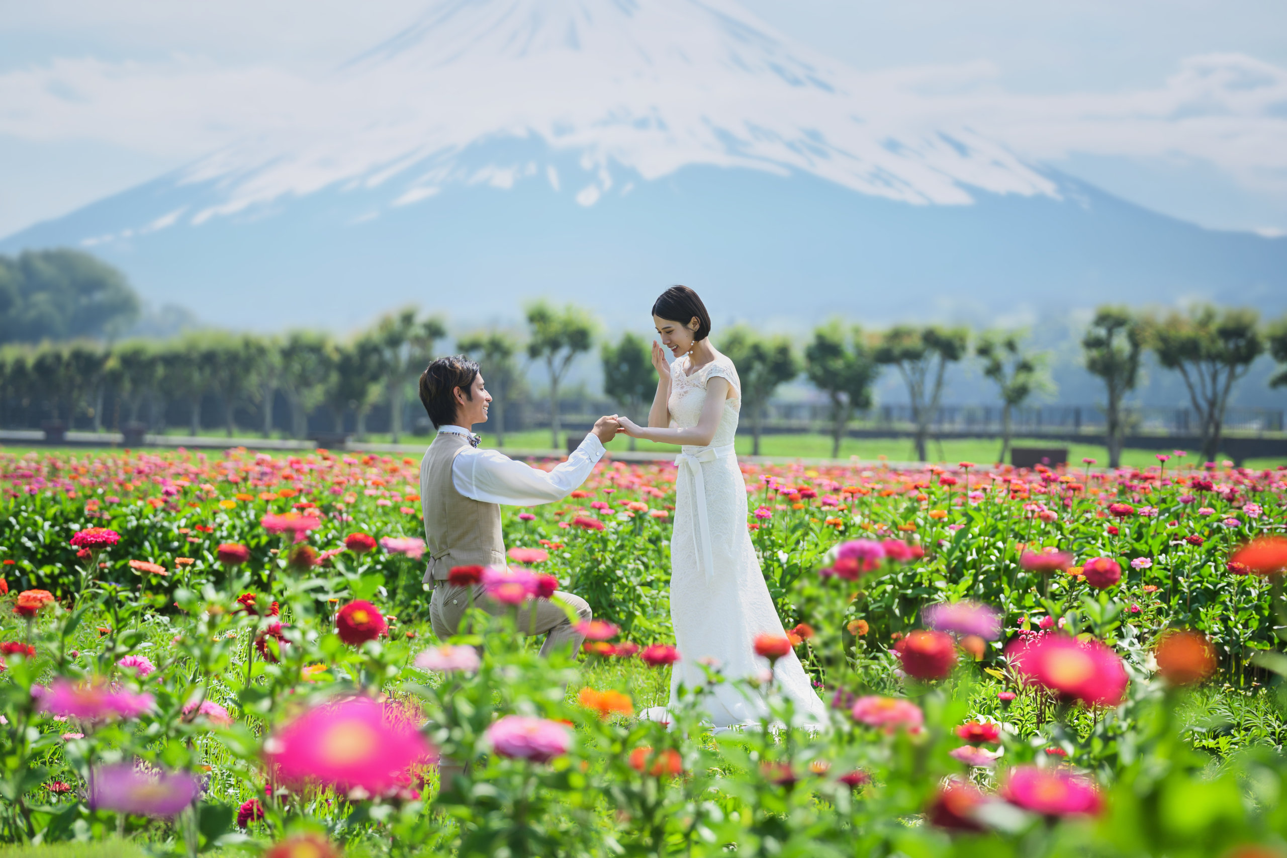 Proposal photo in a flower field with Mt. Fuji in the background
