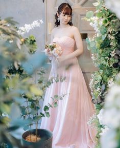 Empire / Light Pink style wedding dress (OCS202): A light pink empire dress with soft tones and flowing silhouette, creating a feminine and graceful impression.