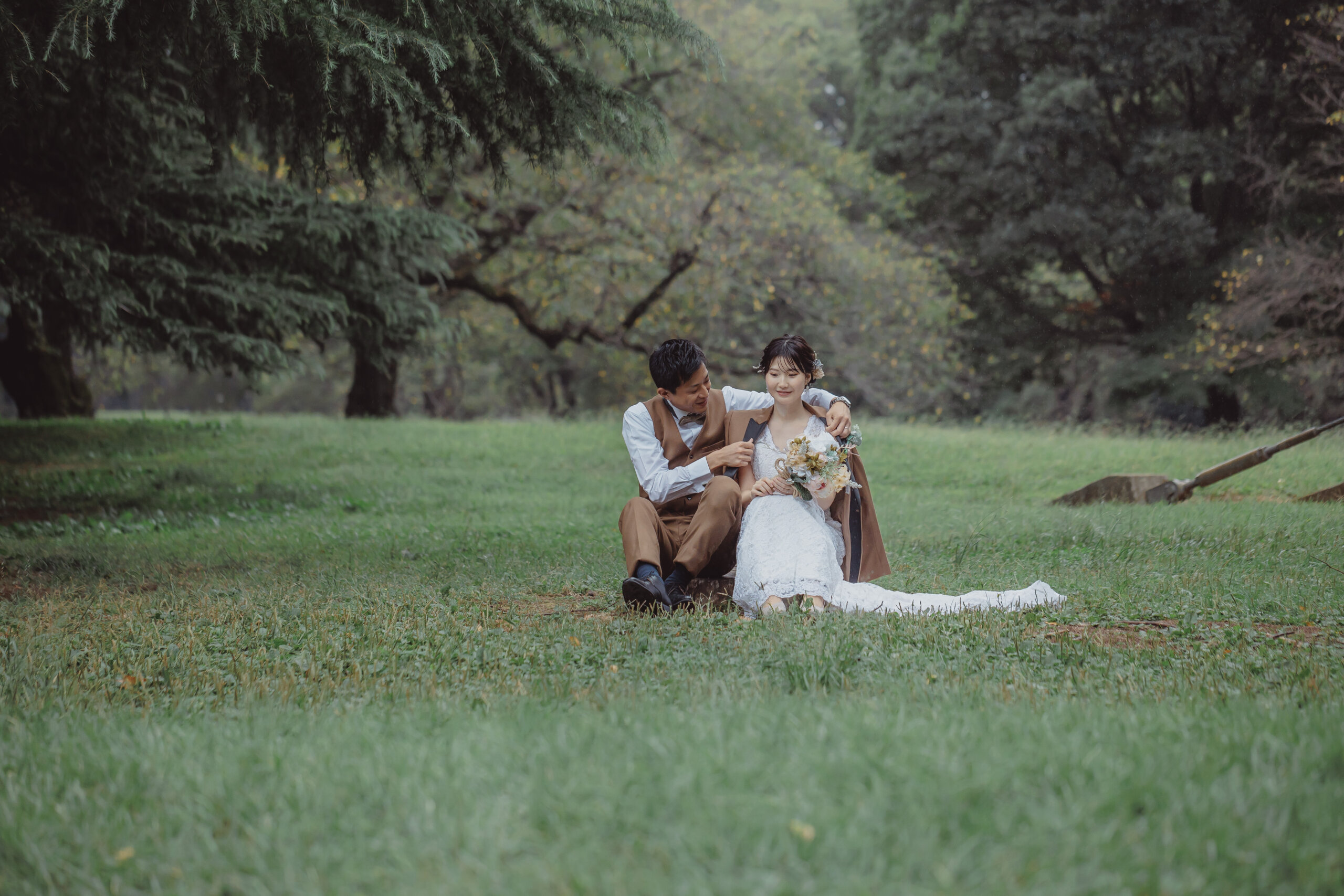 Open lawn shoot at Kinuta Park — wide skies, green grass and a wedding dress create bright, airy outdoor wedding photos